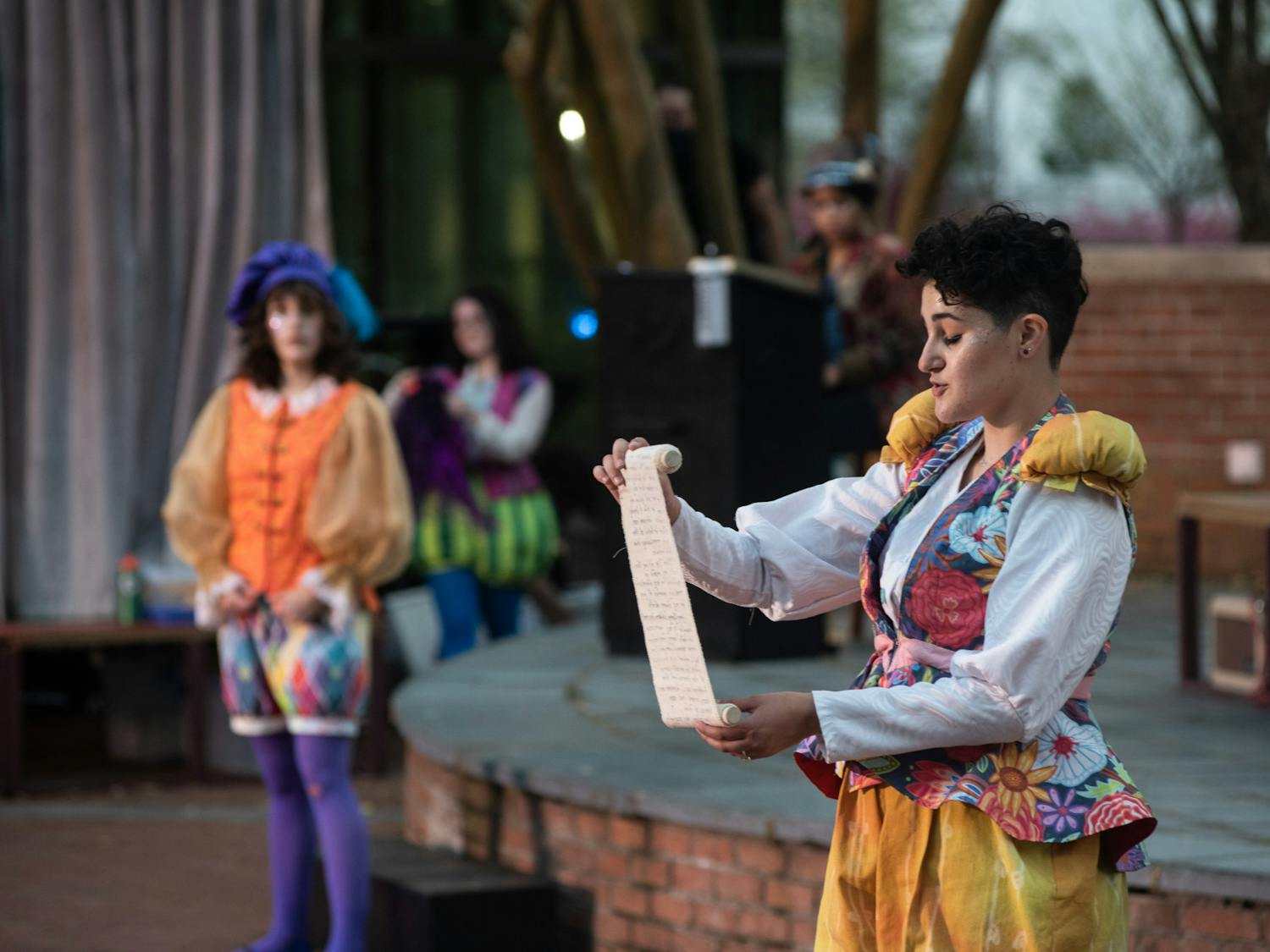 Performers of the USC Theatre Department take part in a production of “The Complete Works of William Shakespeare (Abridged),” performed on the Russell House patio stage in March 2021.