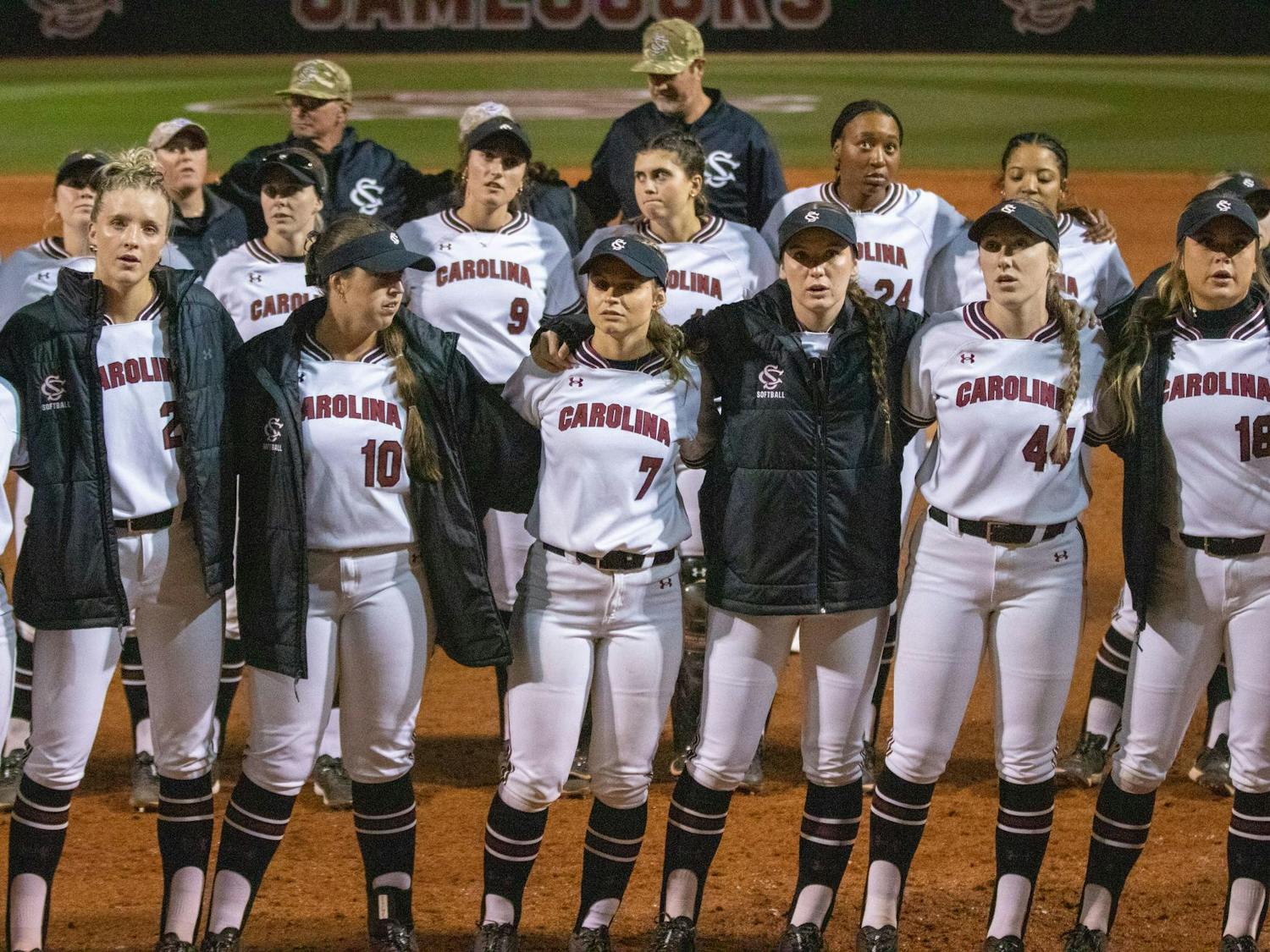 Members of the South Carolina softball team gather near home plate for the alma mater following its game against Mississippi State on April 5, 2024. The Gamecocks lost to the Bulldogs 6-0 and are 27-11 overall in the season.