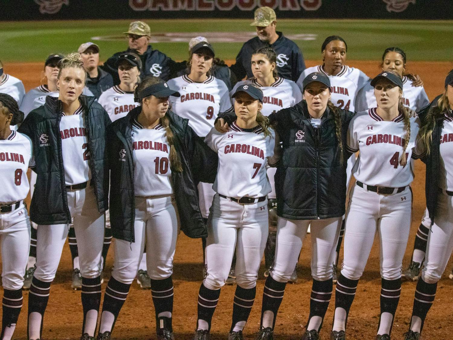 Members of the South Carolina softball team gather near home plate for the alma mater following its game against Mississippi State on April 5, 2024. The Gamecocks lost to the Bulldogs 6-0 and are 27-11 overall in the season.