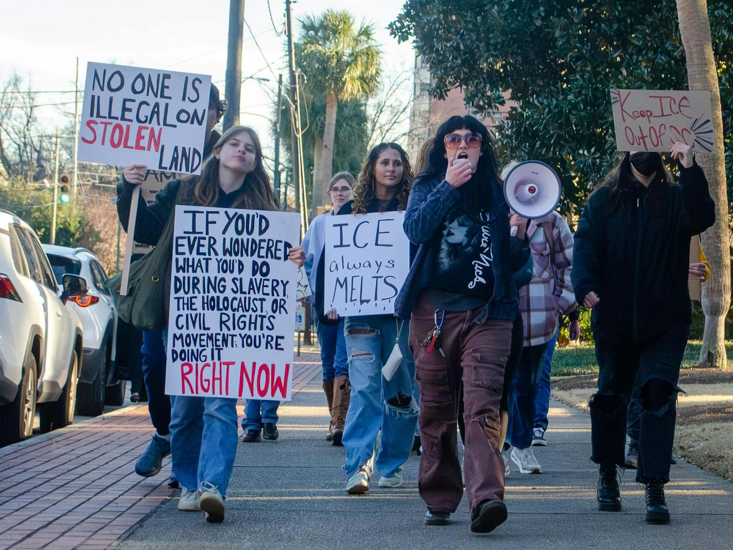 A group of students marches from campus to the statehouse to join a larger protest in Columbia, South Carolina, on Jan. 20, 2026. The student walkout protest was connected to a 5 p.m. protest and march at the Capitol, mainly organized by the Party for Socialism and Liberation.