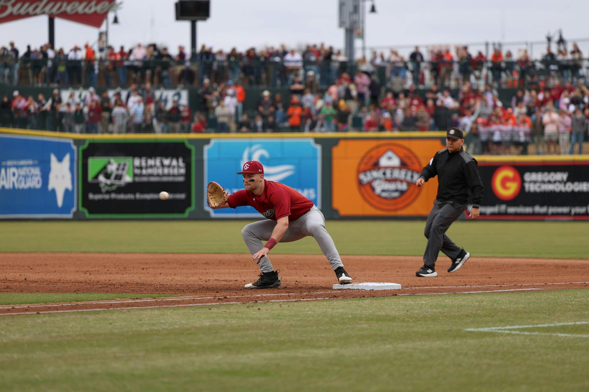 Sophomore first baseman Beau Hollins catches the ball on first base to get the runner out against Clemson at Segra Park on Feb. 28, 2026. The Gamecocks fell short to the Tigers 4-1.