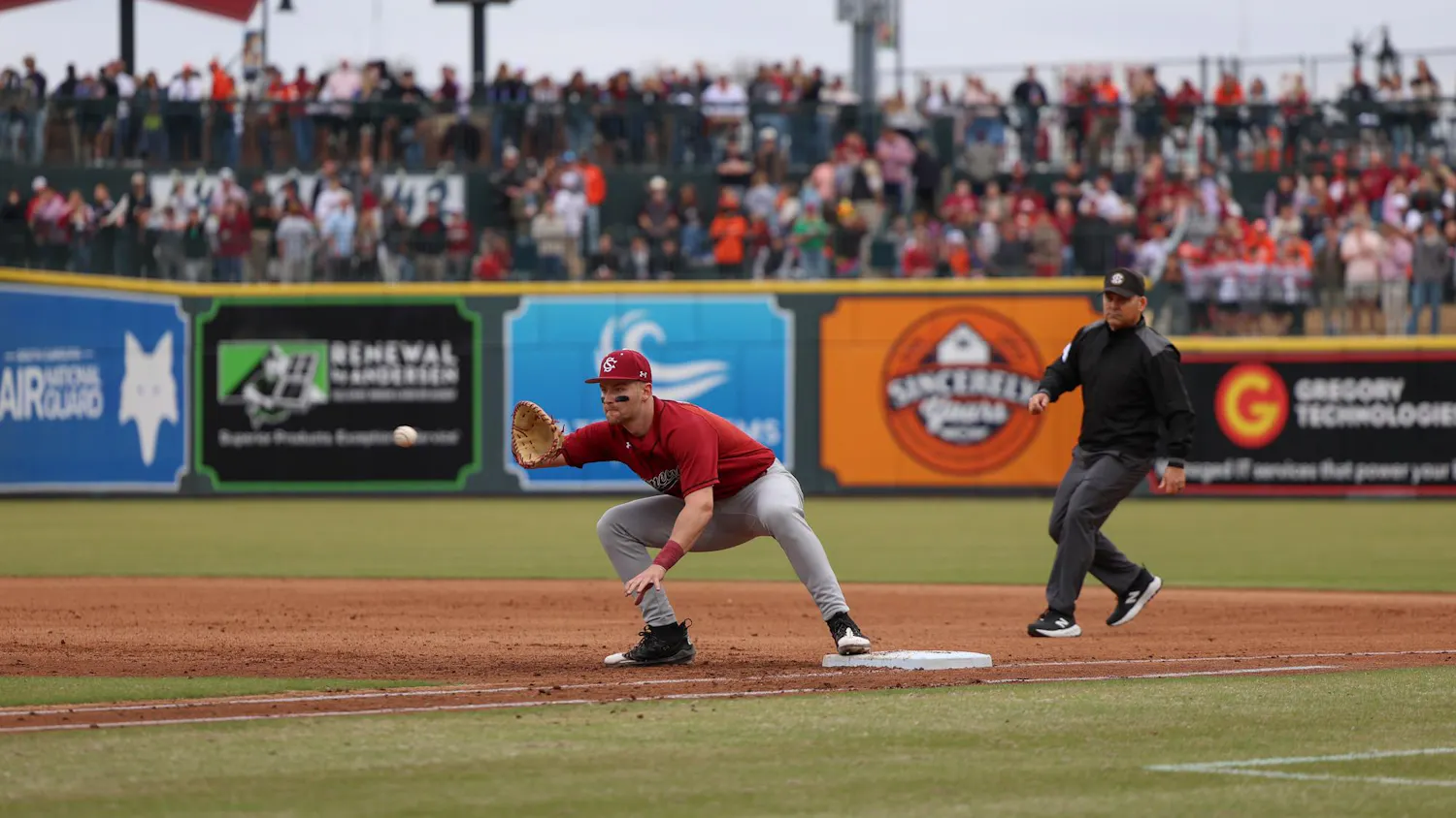 Sophomore first baseman Beau Hollins catches the ball on first base to get the runner out against Clemson at Segra Park on Feb. 28, 2026. The Gamecocks fell short to the Tigers 4-1.