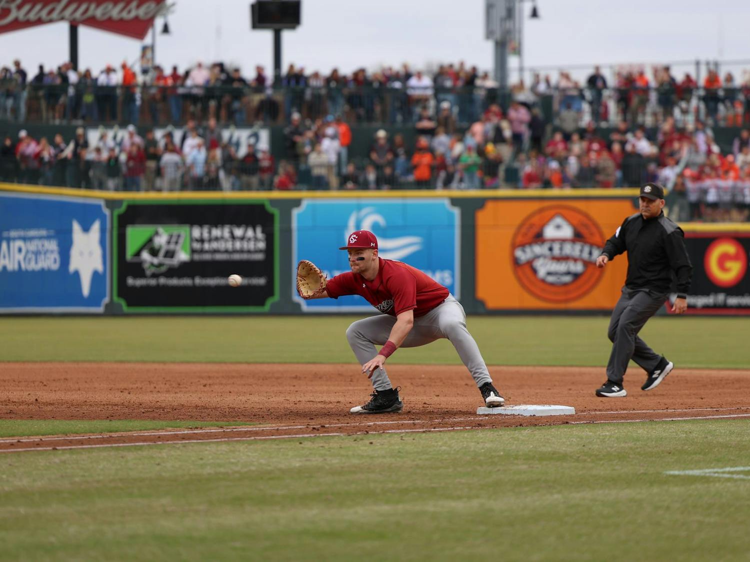 Sophomore first baseman Beau Hollins catches the ball on first base to get the runner out against Clemson at Segra Park on Feb. 28, 2026. The Gamecocks fell short to the Tigers 4-1.