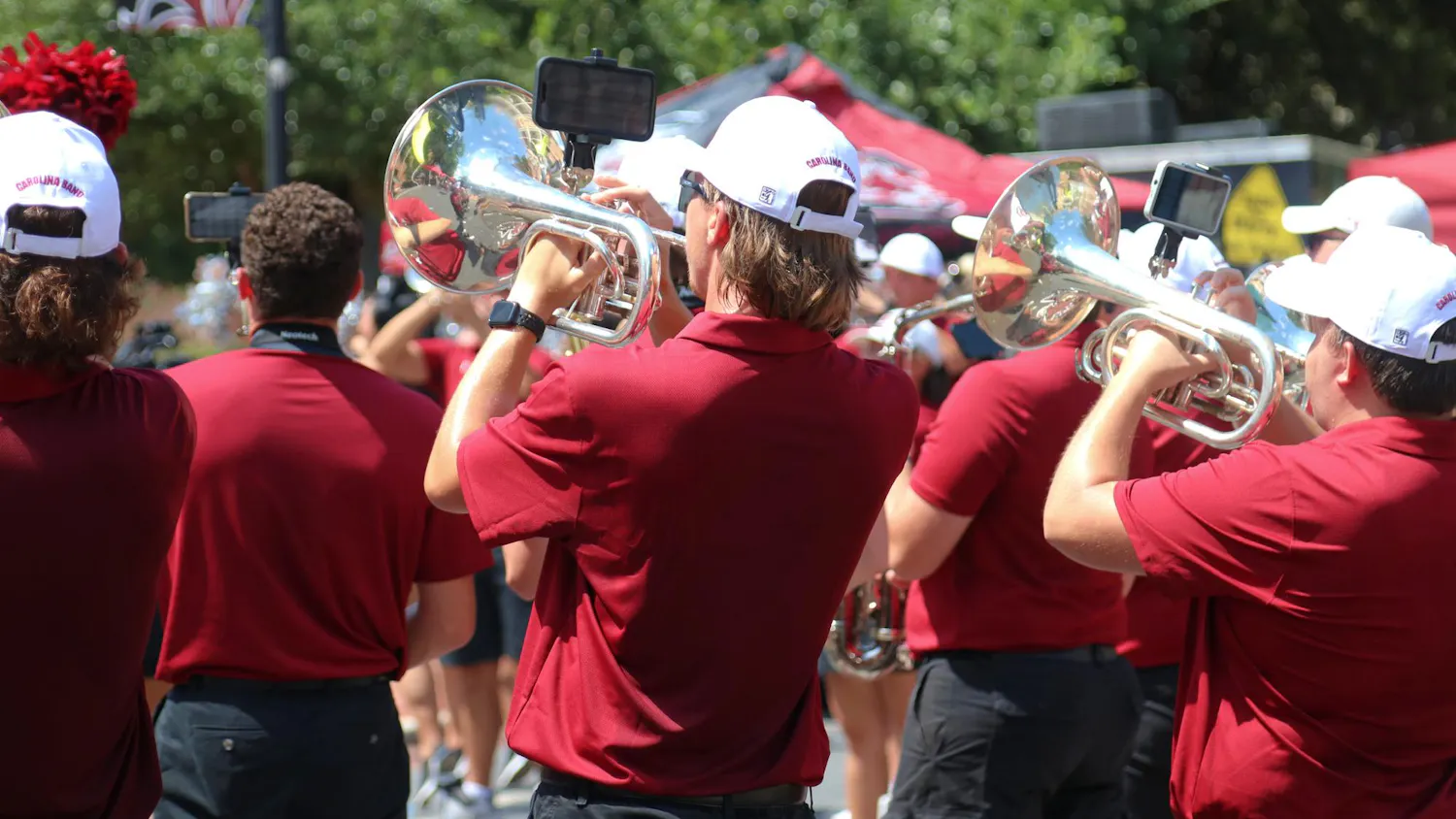 FILE — A Carolina Band member plays their instrument during the Carolina Kickoff event on Greene Street on Aug. 30, 2024. The band played a variety of songs from its typical game-day lineup to prepare students for the first home football game of the season.