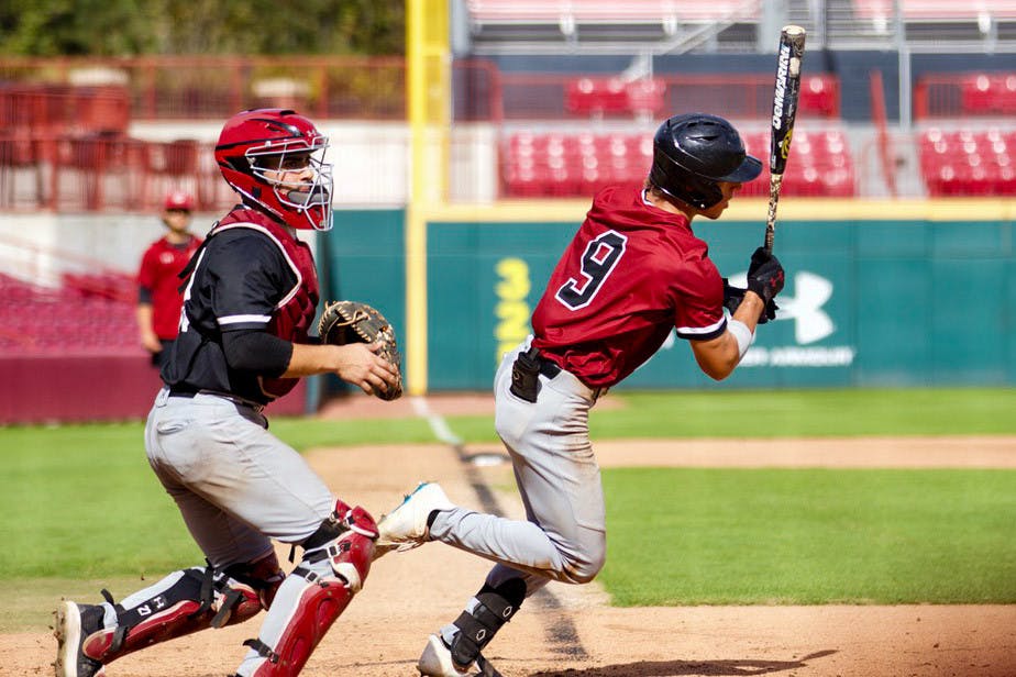 Sophomore outfielder Evan Stone hits the ball for the Garnet team and runs to the base on Nov. 5, 2022. Stone received the SEC First-Year Academic Award following his freshman year.