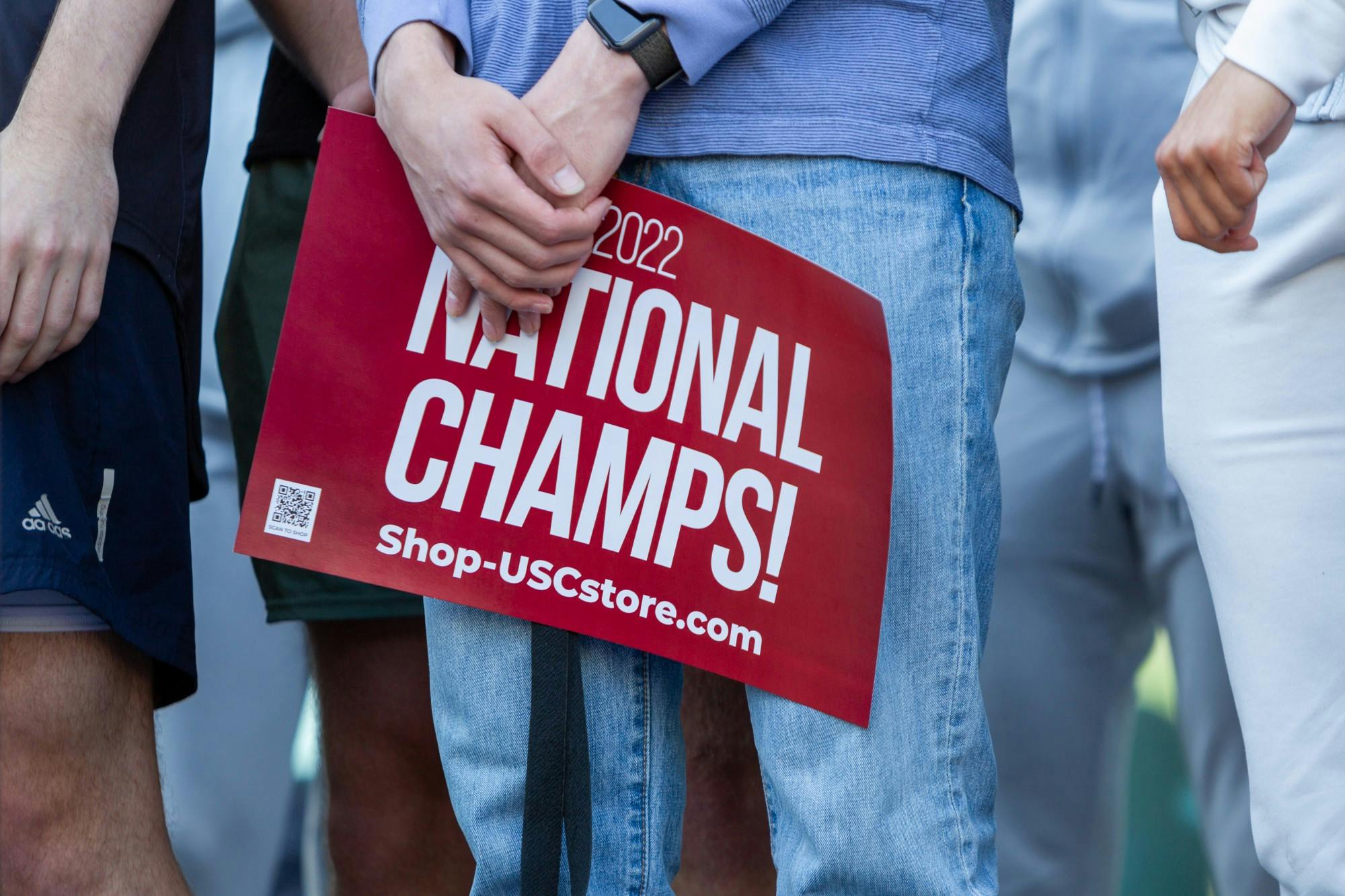 A South Carolina fan holds a sign outside of Colonial Life Arena on April 4, 2022. The arena was crowded with fans in support of the women's basketball team.