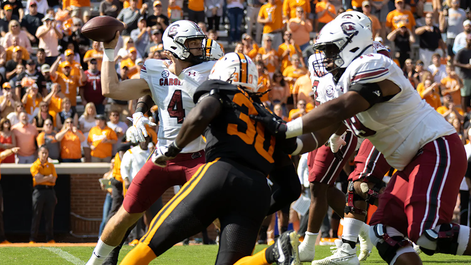 Sophomore quarterback Luke Doty searches for an open receiver before snapping the ball. During this game, Doty made 167 passing yards bringing his total for the season to 733 as of Oct. 9, 2021.