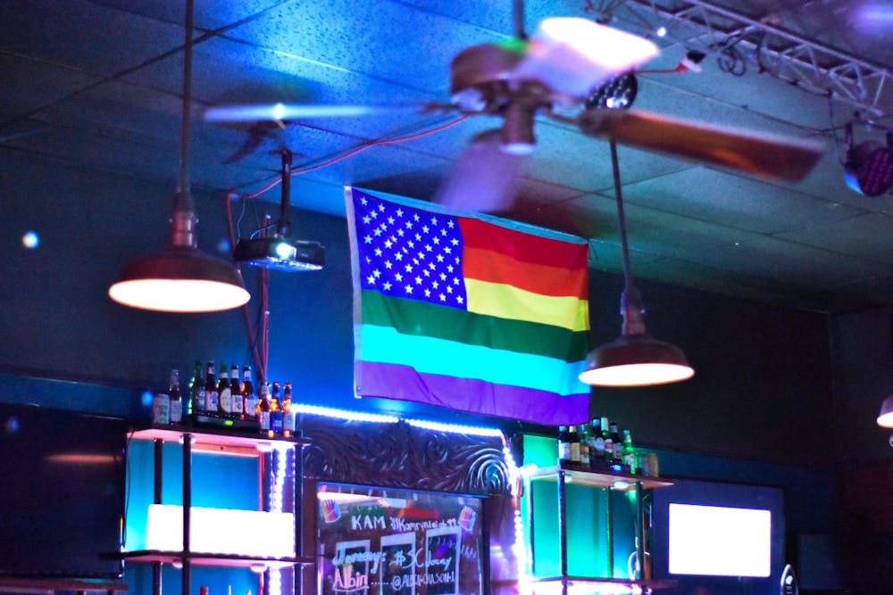 An LGBTQIA+ version of the American flag hangs in The Capital Club on Sept. 15, 2022. The Capital Club is one of Columbia’s most celebrated LGBTQIA+-inclusive bars — being awarded Best Gay Bar by the FreeTimes in 2018.