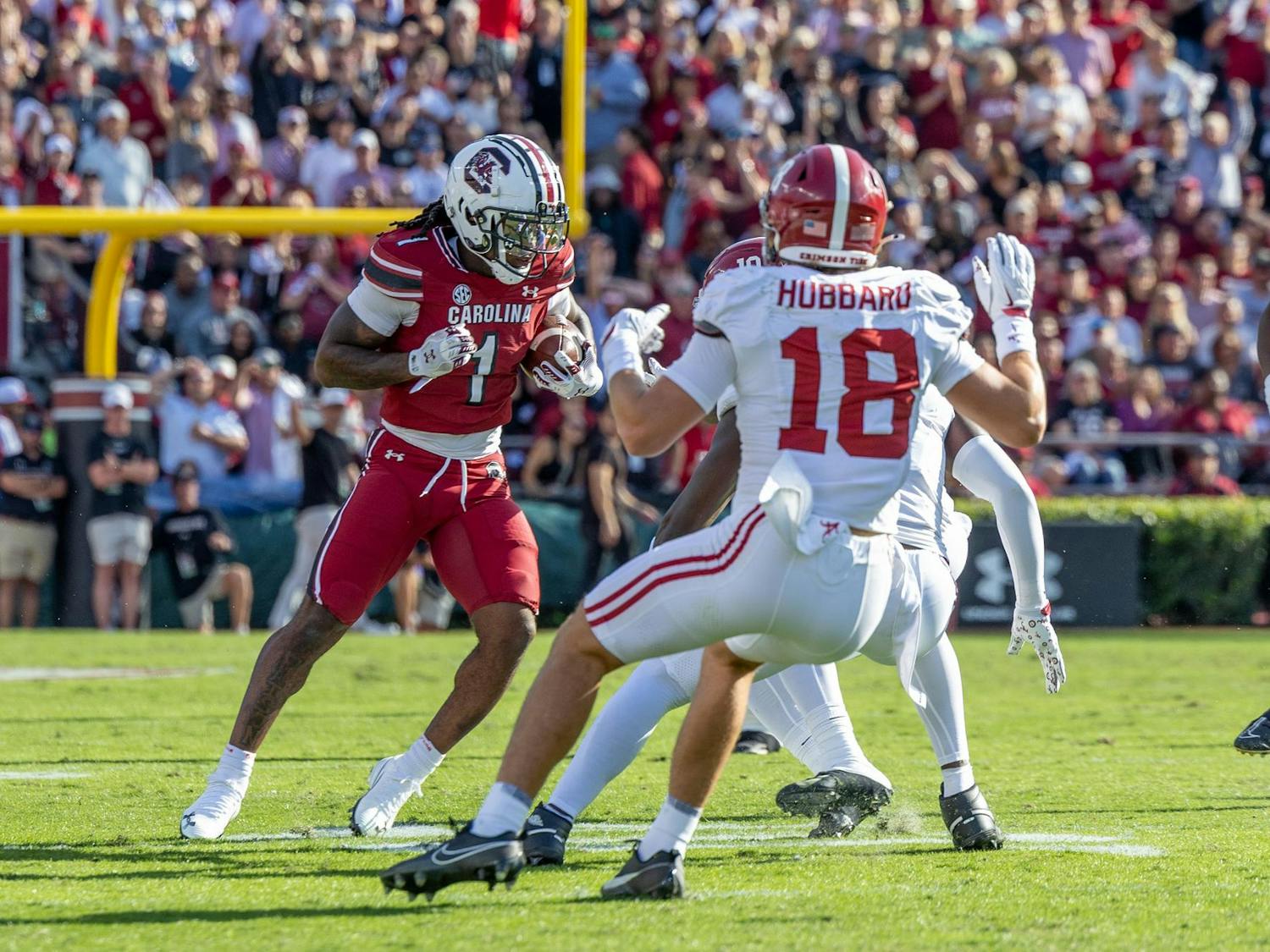 Graduate running back Rahsul Faison carries the ball down the field in a game against Alabama on Oct. 25, 2025, at Williams-Brice Stadium. Faison rushed for 17 yards on five attempts against the Crimson Tide.