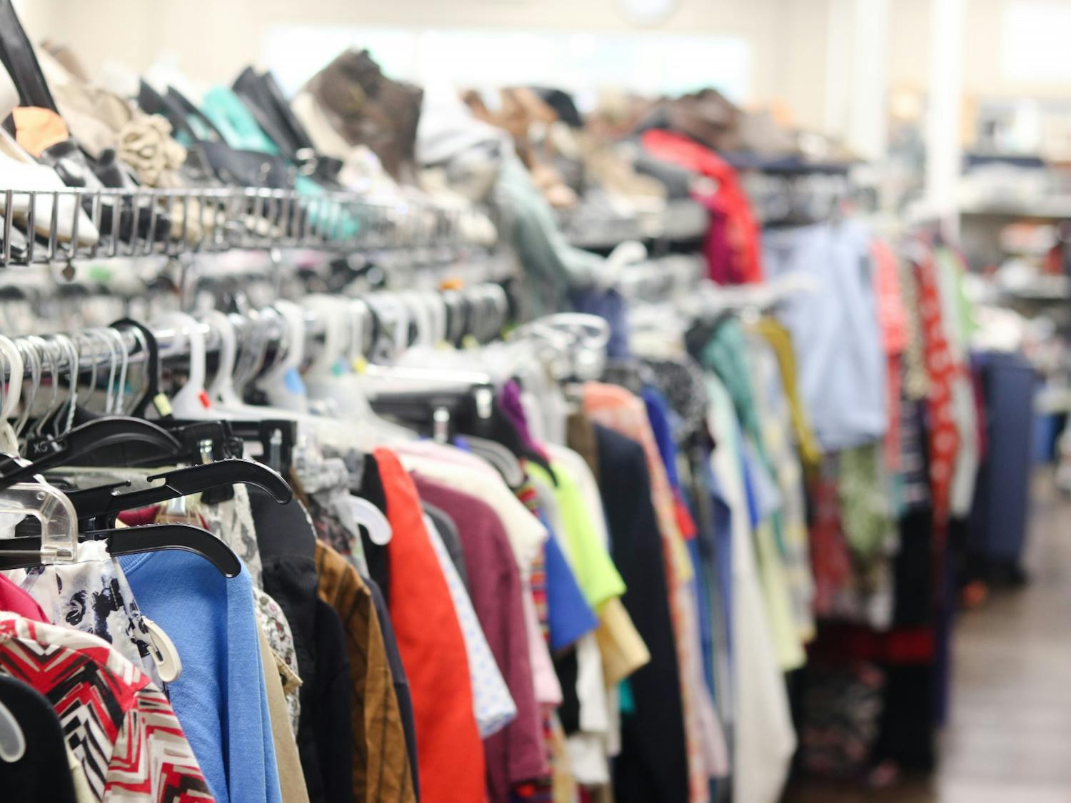 Blouses and other clothes hanging on a rack at His House Ministries Thrift Store on Tuesday, July 19, 2022. This store in West Columbia is one of three locations in the Midlands.&nbsp;