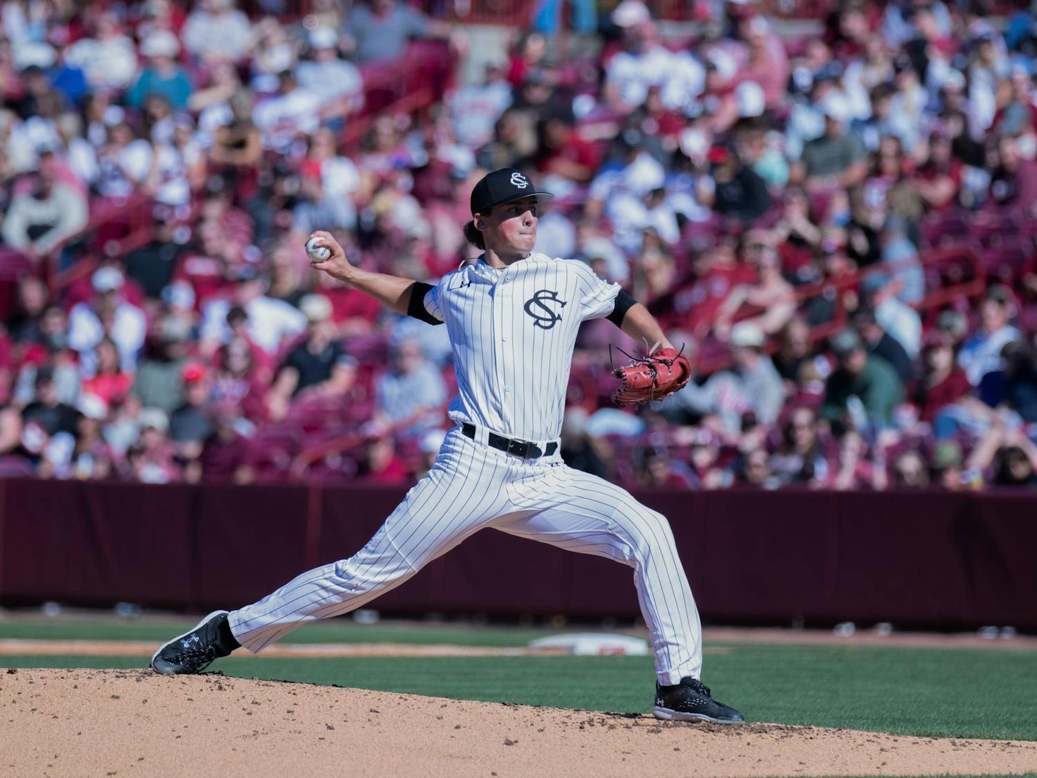 Freshman pitcher Tyler Pitzer throws a pitch from the mound during South Carolina's game against Texas A&M on April 6, 2024. Pitzer threw 2.1 innings for the Gamecocks, earning two strikeouts.