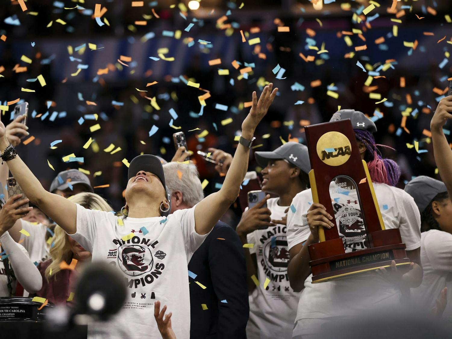 Head coach Dawn Staley takes in the confetti after South Carolina won the National Championship, defeating the Huskies 64-49 on April 3, 2022.
