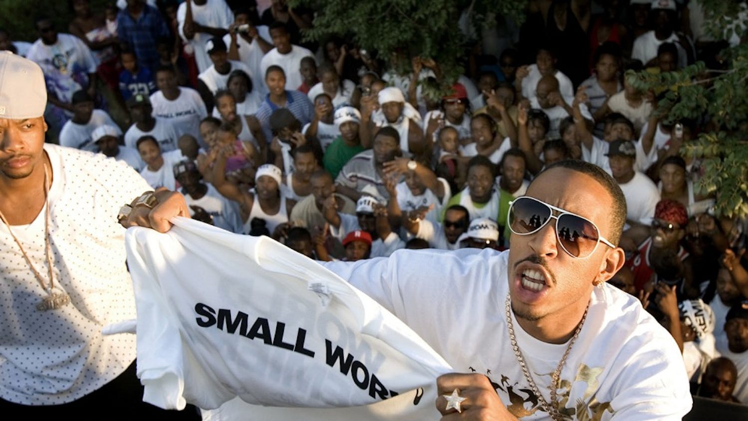 Grammy award winning rapper Ludacris, right, performs during a taping for a video for up-and-coming rapper Sheldon Bullock, known as Small World, 25, at left, August 4, 2007, in Raleigh, North Carolina. Small World wanted Ludacris to be part of his first video, although his first single has already hit the airwaves. (Corey Lowenstein/Raleigh News & Observer/MCT)