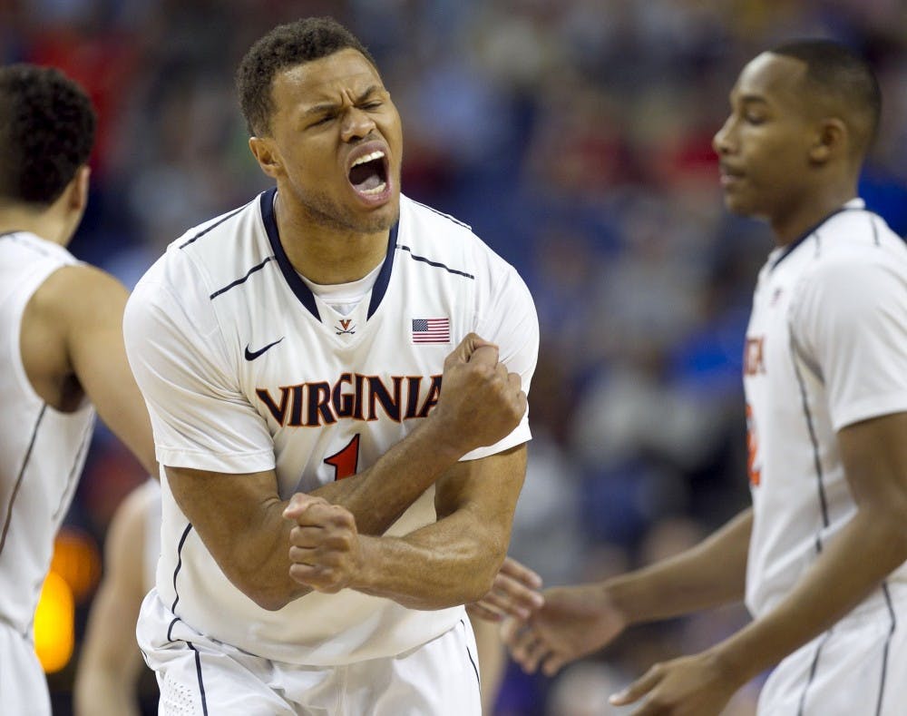 Virginia's Justin Anderson (1) reacts after the Cavaliers secured a three point lead over Pittsburgh in second half of a semifinal at the ACC Tournament in Greensboro, N.C., Saturday, March 15, 2014. Virginia defeated Pitt, 51-48. (Robert Willett/Raleigh News & Observer/MCT)