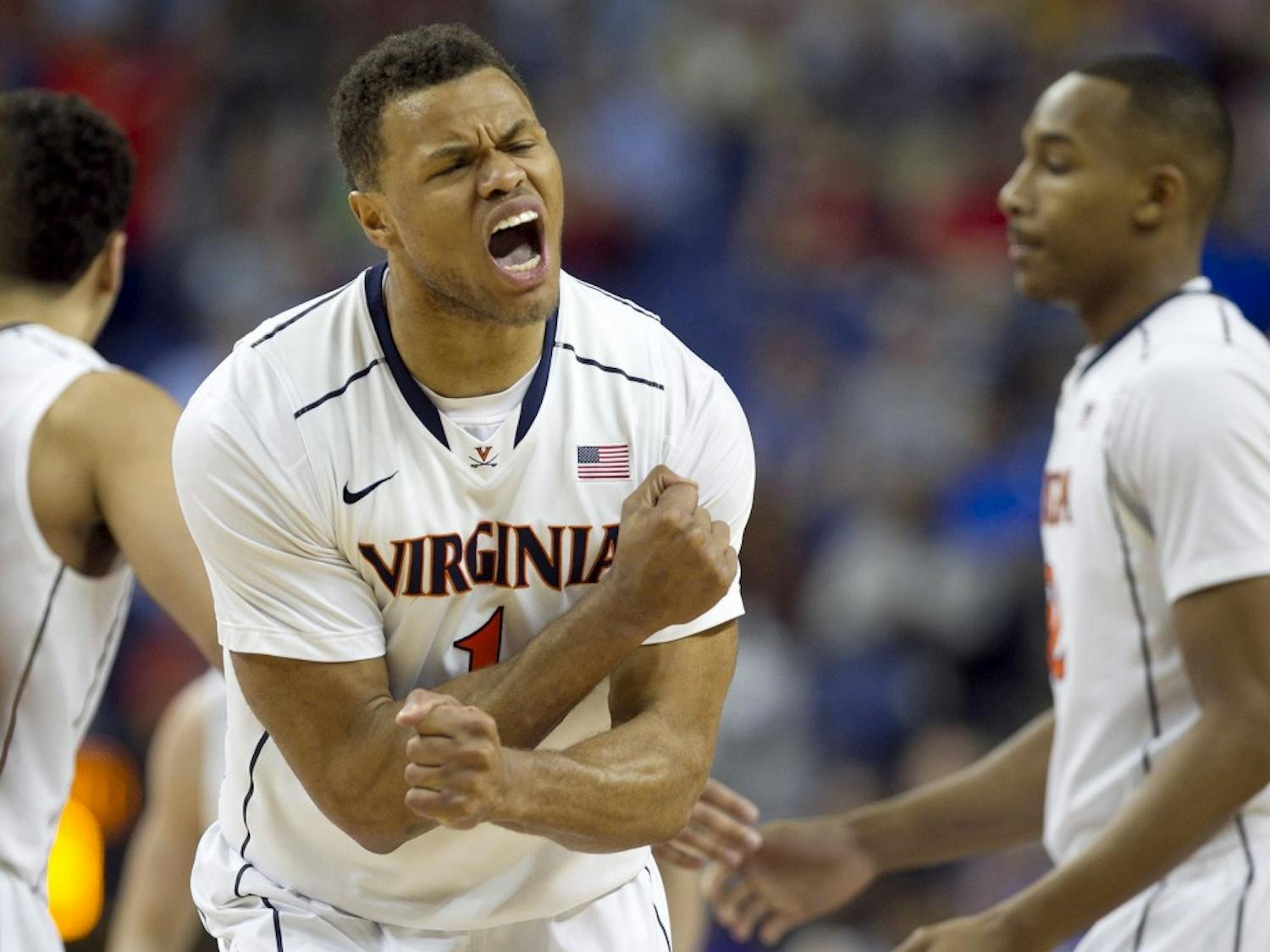 Virginia's Justin Anderson (1) reacts after the Cavaliers secured a three point lead over Pittsburgh in second half of a semifinal at the ACC Tournament in Greensboro, N.C., Saturday, March 15, 2014. Virginia defeated Pitt, 51-48. (Robert Willett/Raleigh News & Observer/MCT)