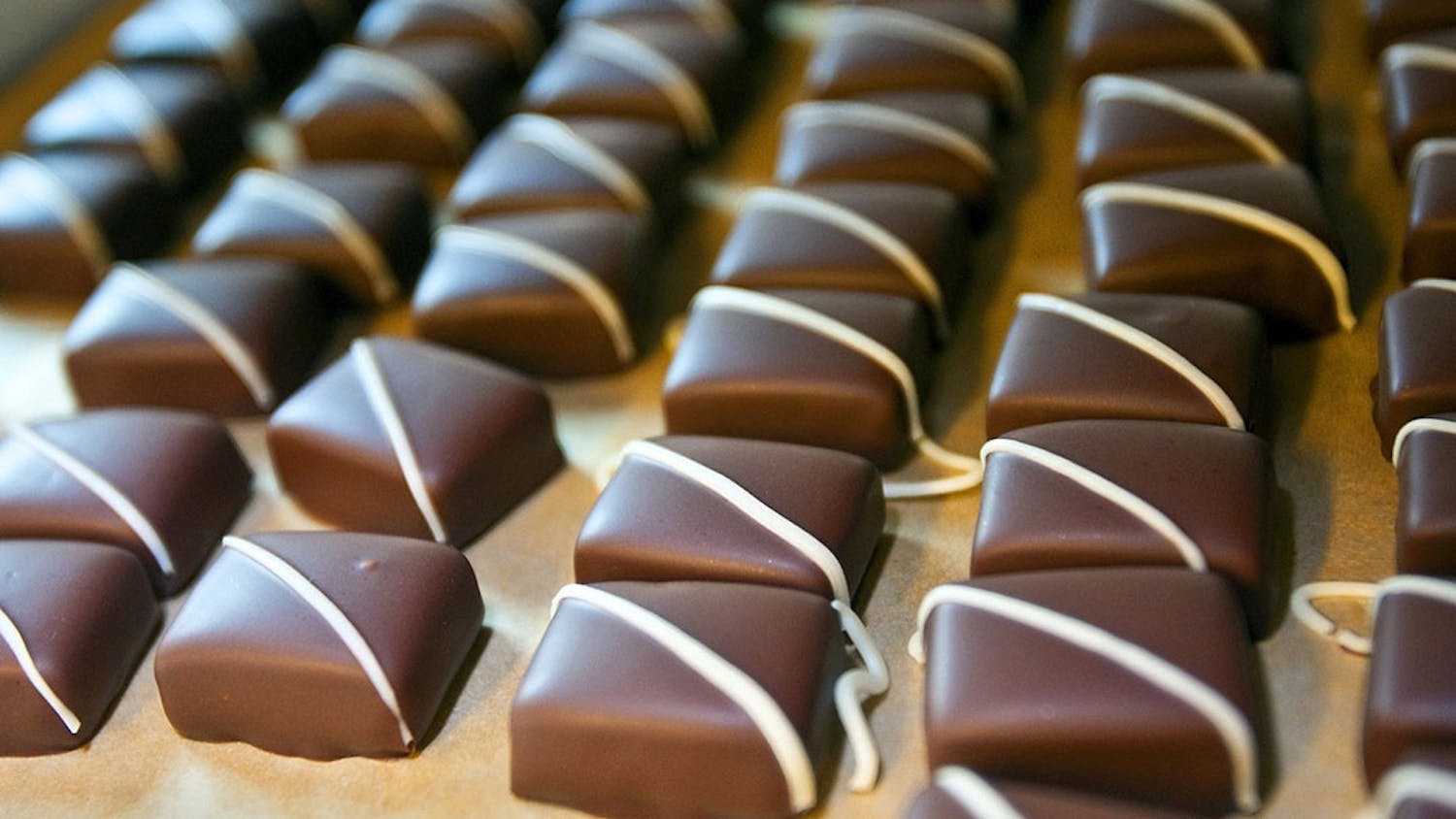 Organic, fair-trade Theo chocolates are stored on trays after cooling in Freemont, Washington