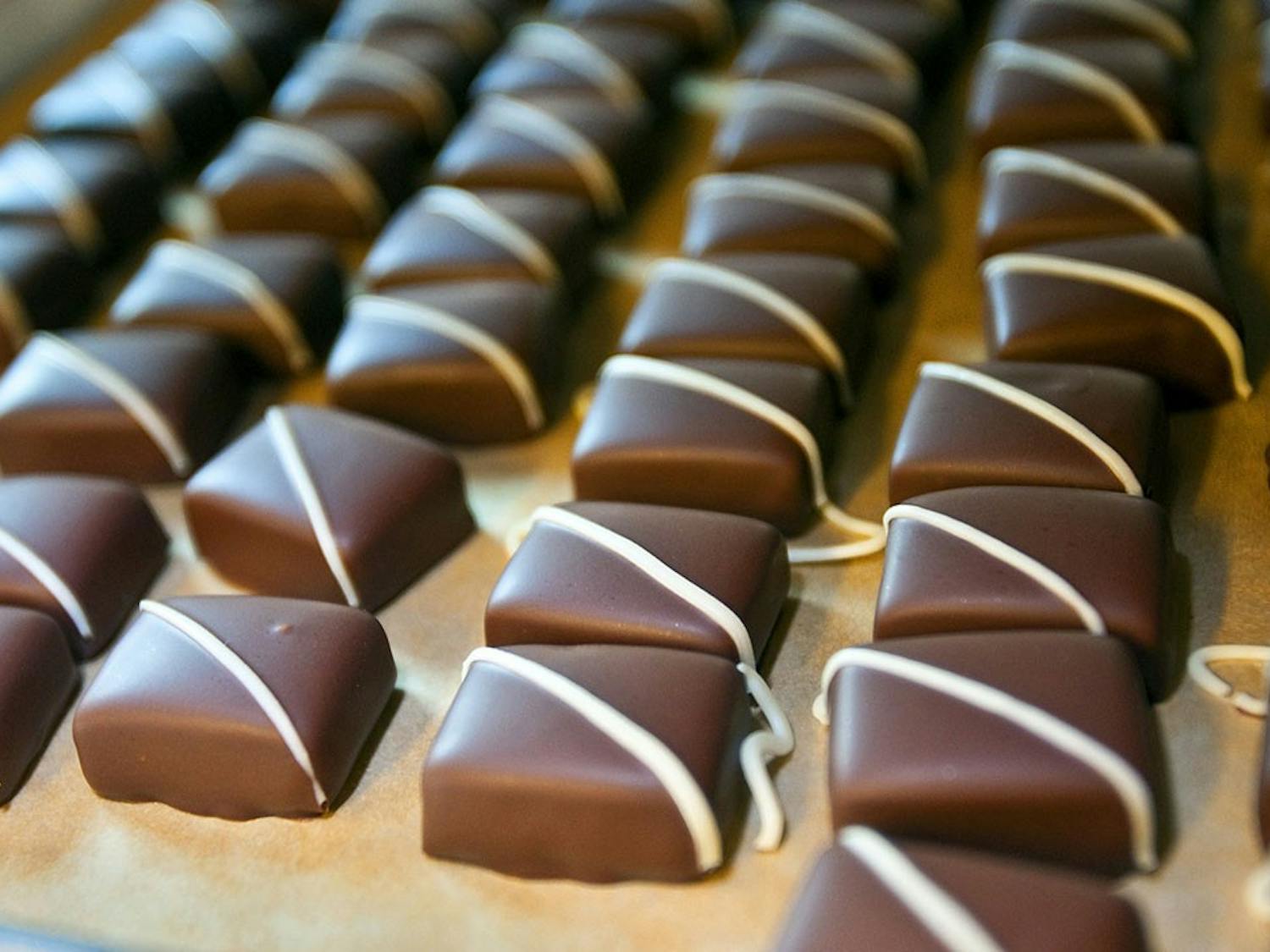 Organic, fair-trade Theo chocolates are stored on trays after cooling in Freemont, Washington