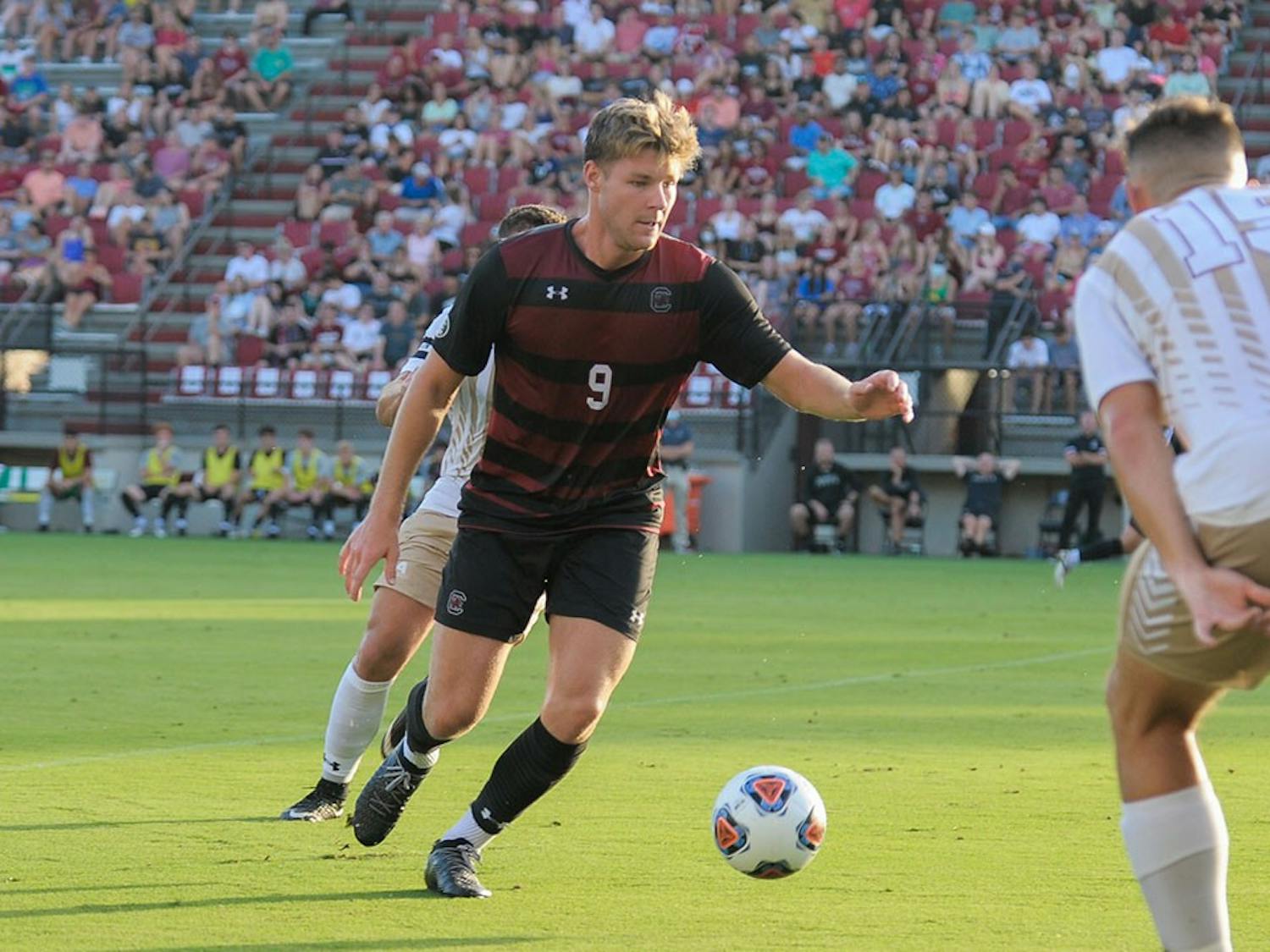 Sophomore defender Christian Kraus receives a pass from a teammate during the season opener against the College of Charleston Cougars. The Cougars beat the Gamecocks 1-0 with a goal during overtime. 