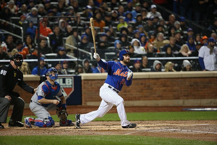 New York Mets second baseman Daniel Murphy (28) watches his two-run home run in the first inning Game 2 of the National League Championship Series playoff Sunday, Oct. 18, 2015, at Citi Field in New York. (Brian Cassella/Chicago Tribune/TNS) 