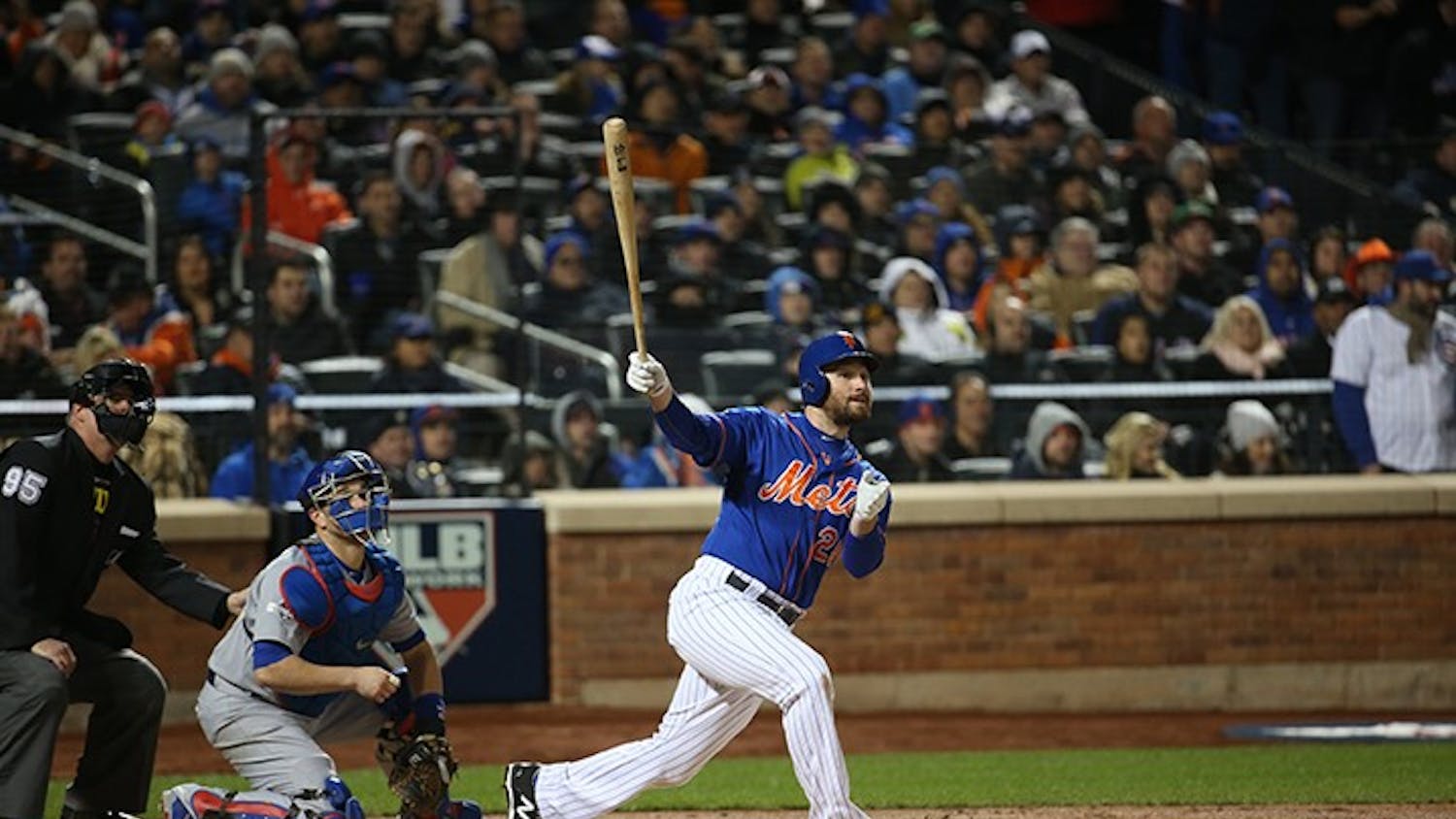 New York Mets second baseman Daniel Murphy (28) watches his two-run home run in the first inning Game 2 of the National League Championship Series playoff Sunday, Oct. 18, 2015, at Citi Field in New York. (Brian Cassella/Chicago Tribune/TNS) 