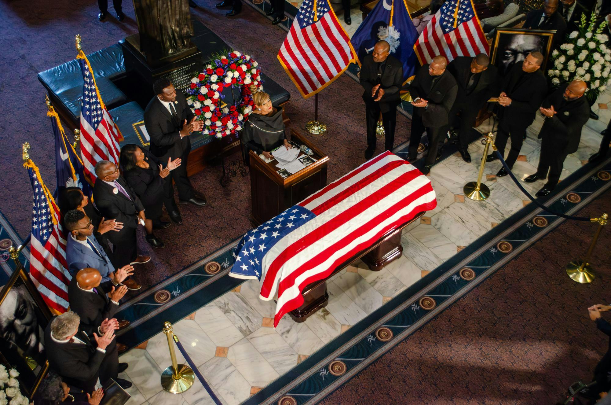 Mourners applaud remarks given at the lying-in-state of the Rev. Jesse Jackson in the South Carolina State House on March 2, 2026. Jackson is the second Black man to lie in state at the South Carolina Capitol, after Clementa Pinckney, who was assassinated by white supremacist Dylann Roof during the Charleston church shooting.