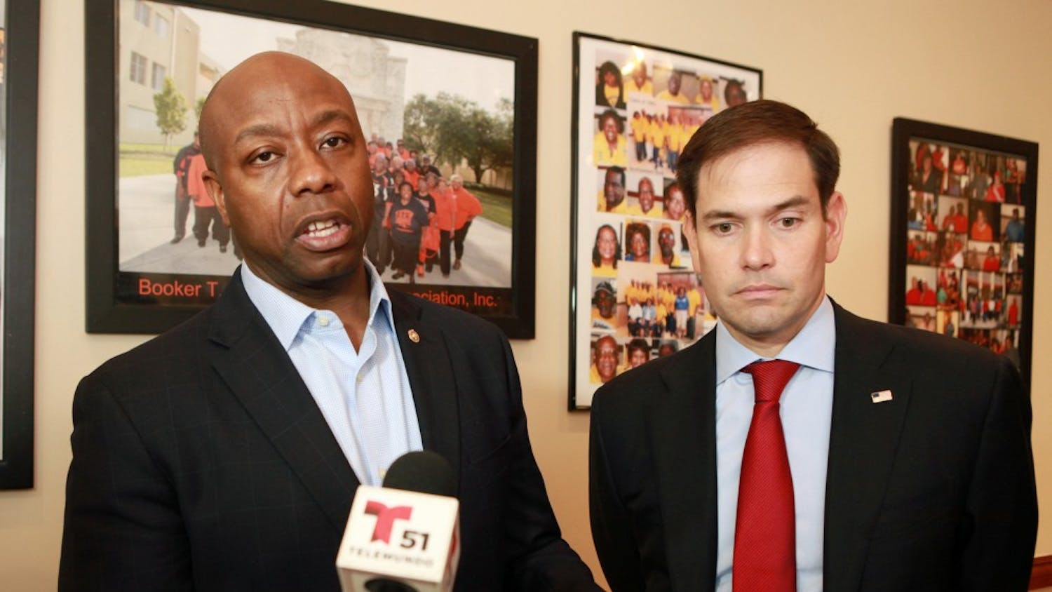 Senators Tim Scott, left, and Marco Rubio talk to the media after the meeting with religious leaders at Jackson Soul Food on Wednesday Nov. 2, 2016 in Miami. (Roberto Koltun/Miami Herald/TNS) 