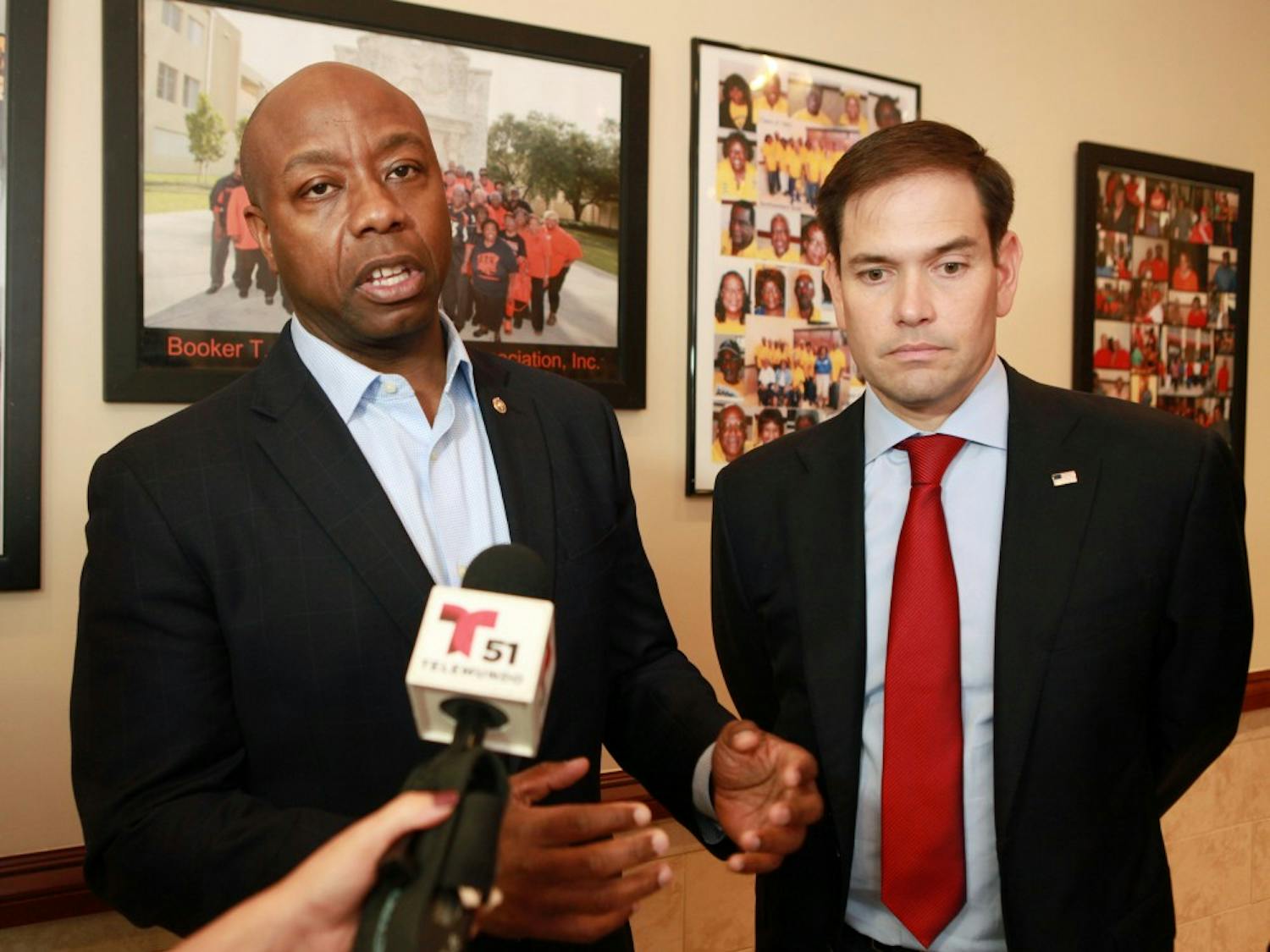 Senators Tim Scott, left, and Marco Rubio talk to the media after the meeting with religious leaders at Jackson Soul Food on Wednesday Nov. 2, 2016 in Miami. (Roberto Koltun/Miami Herald/TNS)