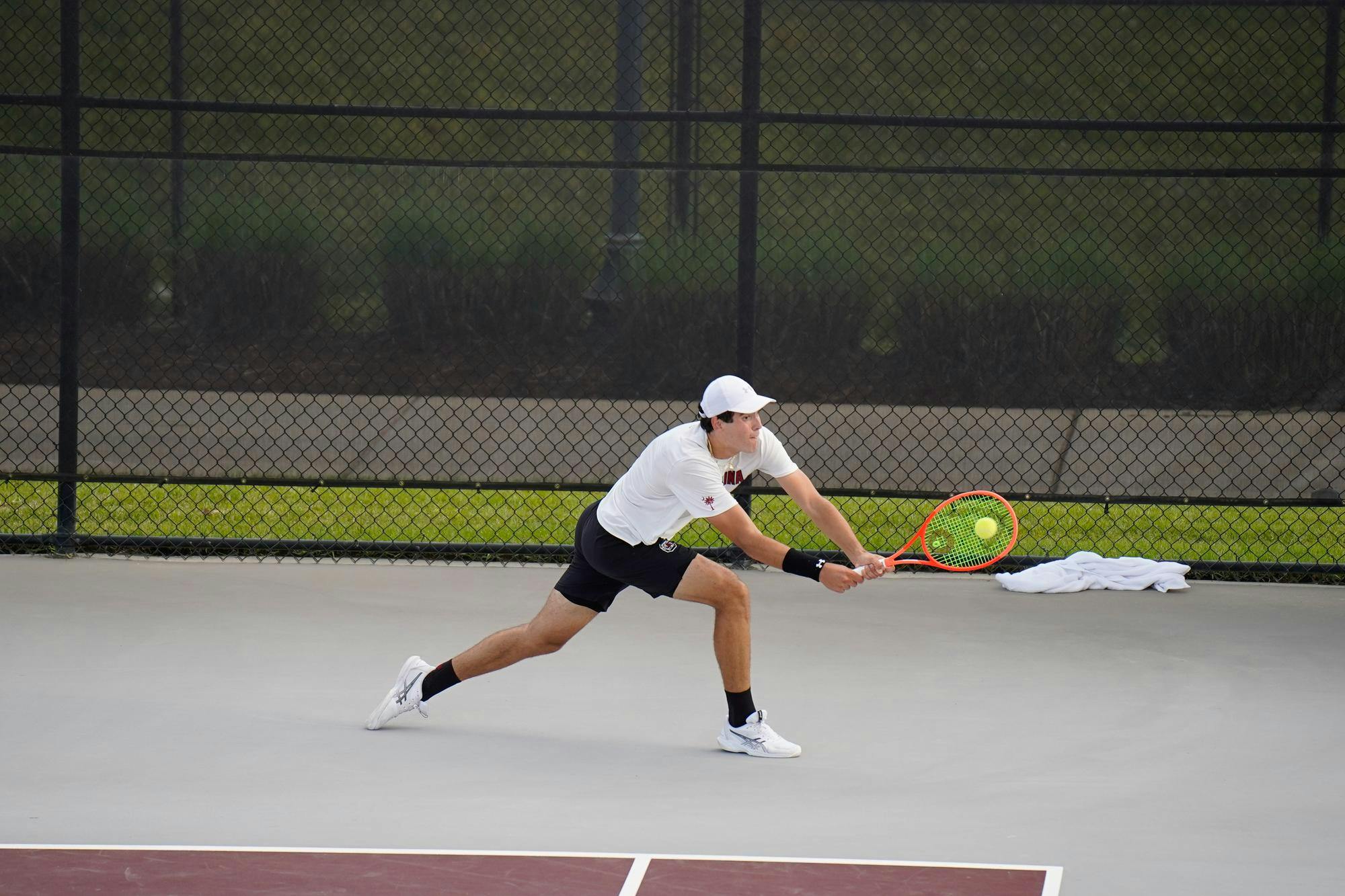 Senior Lucas Andrade da Silva returns a hit in his singles matchup against Vanderbilt at the Carolina Tennis Center on Apr. 4, 2026. Silva lost sets one and two 7-5 and 5-2.