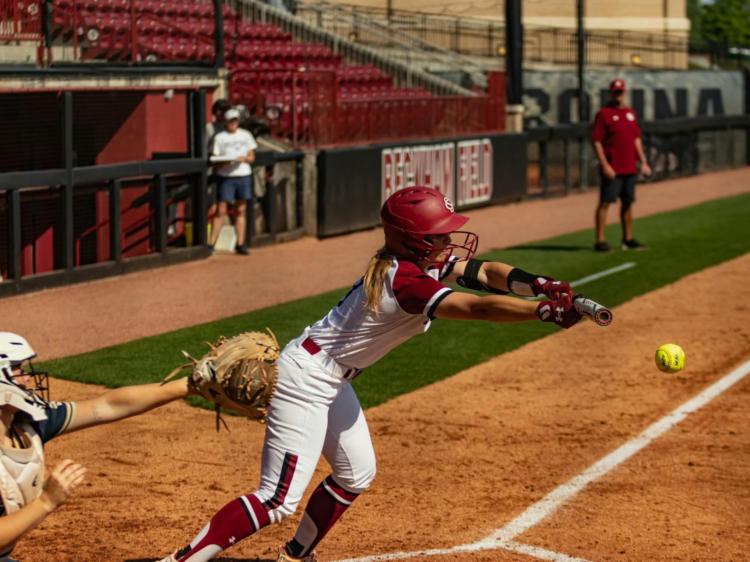 Sophomore catcher and infielder Giulia Desiderio bunts the ball during the first game against Charleston Southern at Beckham Field on April 19, 2023. The Gamecocks beat the Buccaneers 5-0.&nbsp;