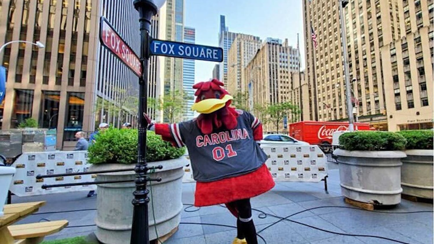 Cocky leaning up against the Fox Square sign outside of the Fox Network studios.