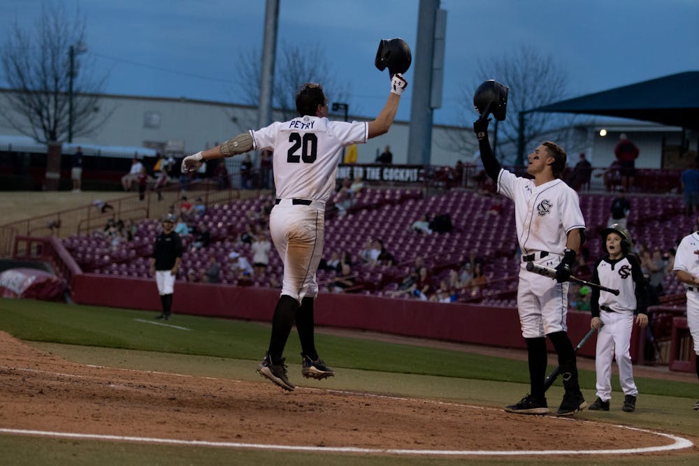 <p>Freshman pitcher Ethan Petry jumps on the plate with excitement after smashing his second home run of the game at 365 feet at Founders Park on Feb. 21, 2023. Petry’s 3-4 runs scored and four RBIs helped the Gamecocks defeat the Eagles 19-3.</p>