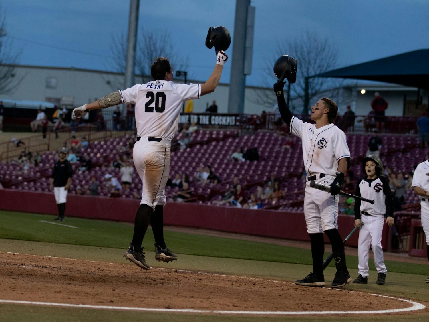 Freshman pitcher Ethan Petry jumps on the plate with excitement after smashing his second home run of the game at 365 feet at Founders Park on Feb. 21, 2023. Petry’s 3-4 runs scored and four RBIs helped the Gamecocks defeat the Eagles 19-3.