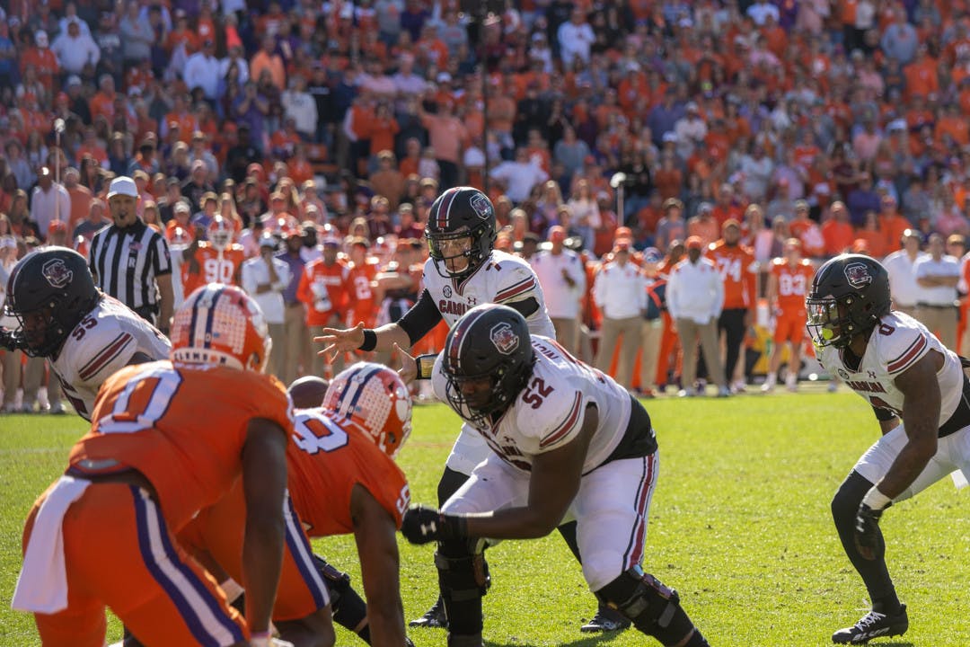Redshirt junior quarterback Spencer Rattler calls for the snap before handing off the ball to junior tight end Jaheim Bell on Nov. 28, 2022 at Memorial Stadium. Bell would go on to score a touchdown, bringing the score to 21-23 with 12 minutes left in the third quarter.