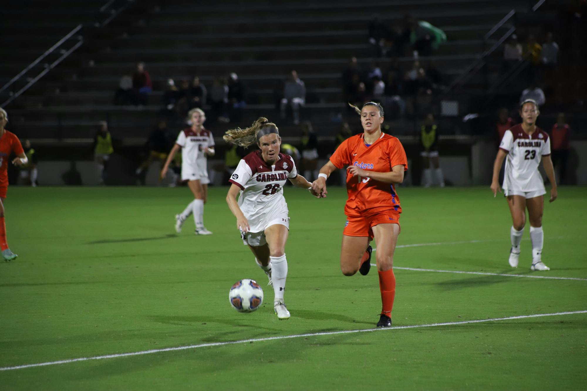 FILE—Redshirt senior midfielder Claire Griffiths races down the field to claim the ball before her Florida opponent during a game on Sept. 28, 2022.
