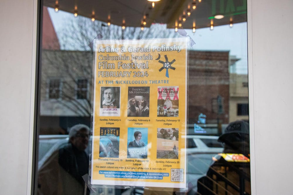 <p>A poster for the Arline &amp; Gerald Polinsky Columbia Jewish Film Festival is displayed in the window of the Nickelodeon Theater in Columbia on Feb. 18, 2024. The festival showcases unique films highlighting Jewish culture and history.</p>
