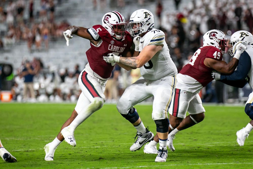 <p>Fifth-year edge Kyle Kennard tries to push past the defense toward the Zips quarterback during South Carolina's game against Akron on Sept. 21, 2024. Kennard is in his first season with the Gamecocks after transferring from Georgia Tech.</p>