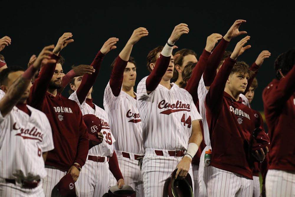 <p>FILE – South Carolina baseball players participate in the school’s alma mater after an 8-1 victory against Belmont on Feb. 23, 2024. The Gamecocks are 6-0 on the season.</p>