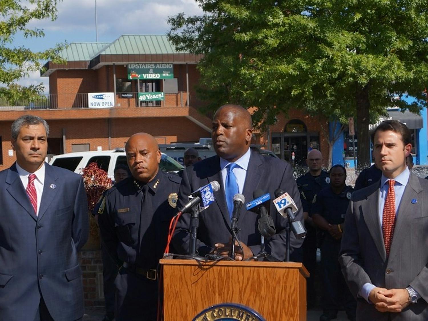 Columbia Police Chief Randy Scott (left) and Mayor Steve Benjamin announced their plans to curb violence and other crime in Five Points at a Thursday afternoon press conference.
