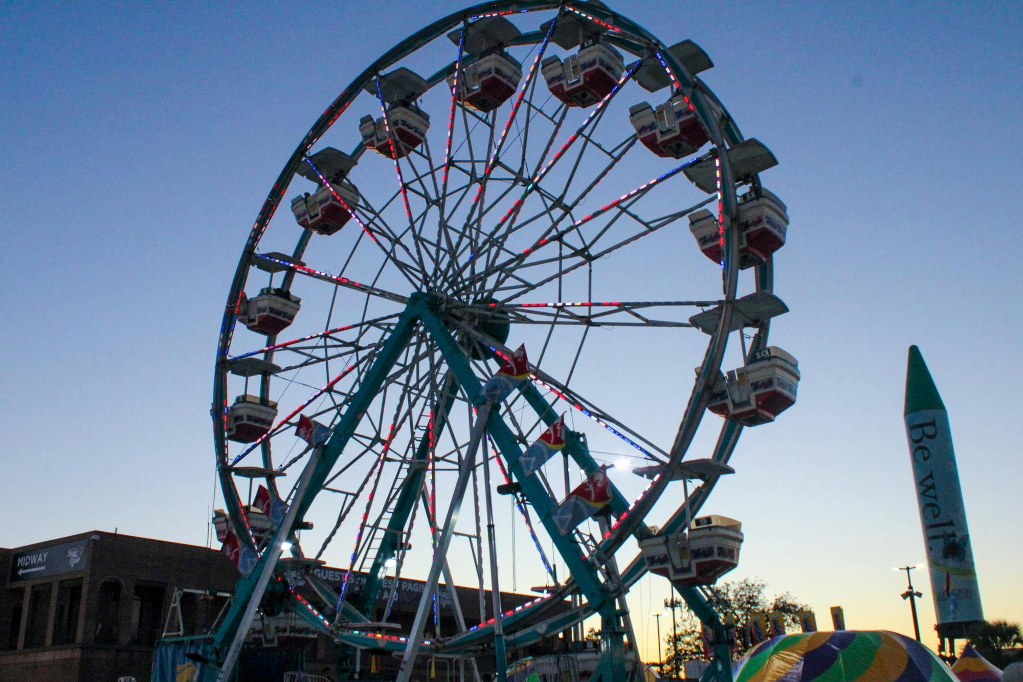 A ferris wheel at the South Carolina State Fair operates with riders on Oct. 14, 2025. The fair has more than 60 rides this year, in addition to carnival games and live entertainment.