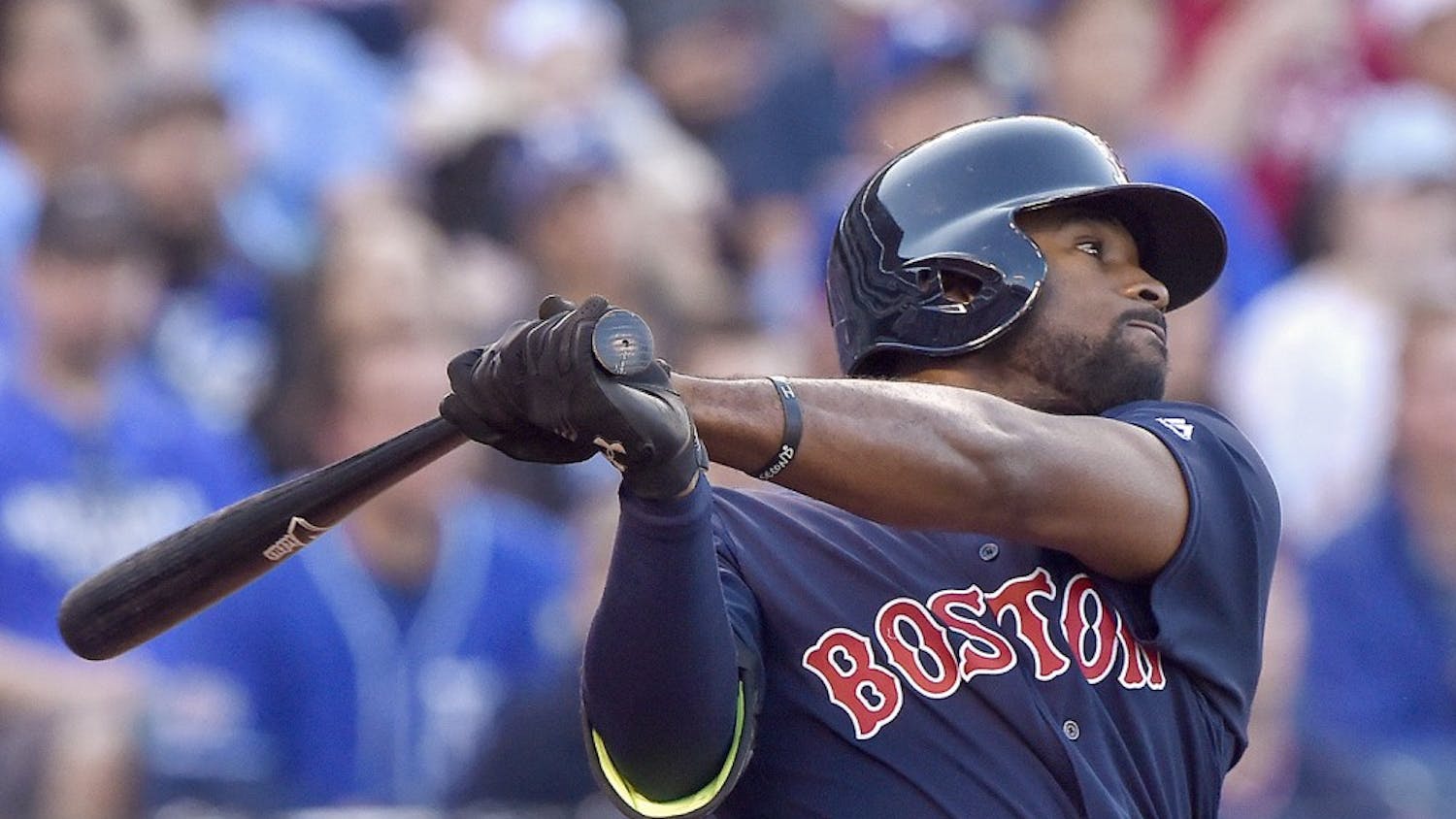The Boston Red Sox's Jackie Bradley Jr. follows through on a solo home run in the second inning against the Kansas City Royals in the second game of a doubleheader on Wednesday, May 18, 2016, at Kauffman Stadium in Kansas City, Mo. (John Sleezer/Kansas City Star/TNS)