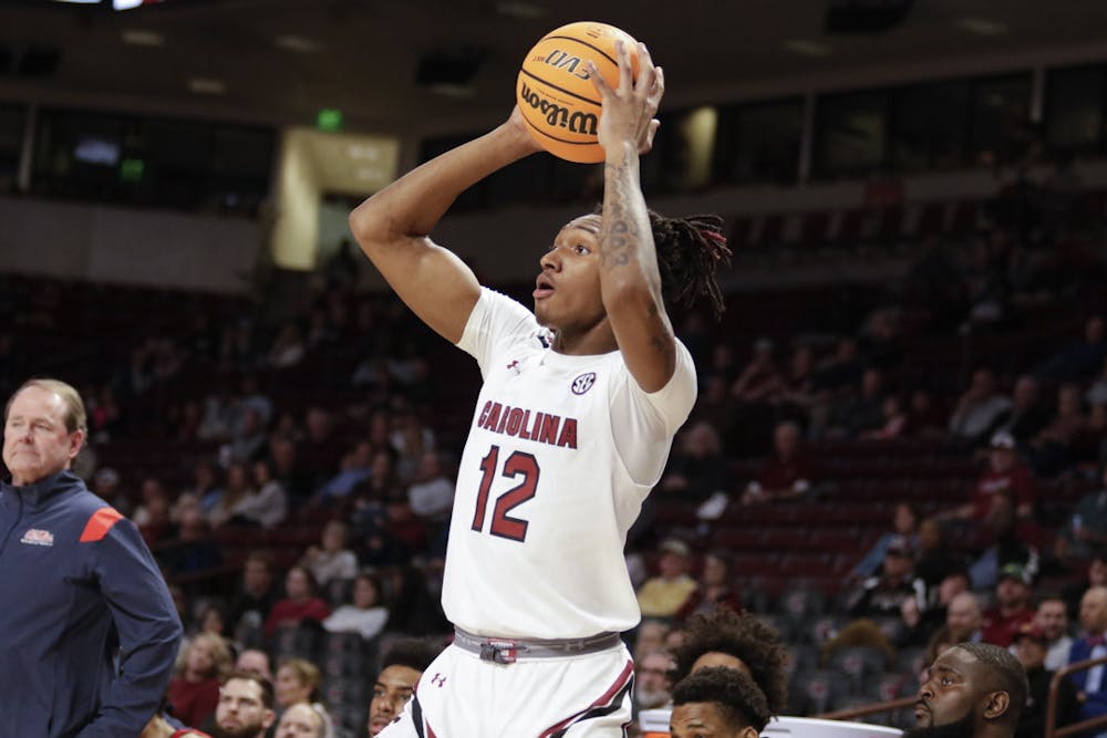 <p>FILE—Freshman guard Zachary Davis looks for a teammate to pass the ball to during the game against the Ole Miss Rebels at Colonial Life Arena on Jan. 17, 2023. The South Carolina Gamecocks lost to the Rebels 70-58.&nbsp;</p>