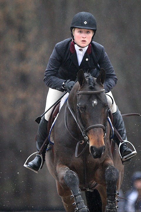 South Carolina&apos;s Amber Henter competes in Equitation Over Fences during the SEC Equestrian championships against Georgia at One Wood Farm in Blythewood, S.C., Saturday, March 29, 2014. (C Michael Bergen/The State/MCT)