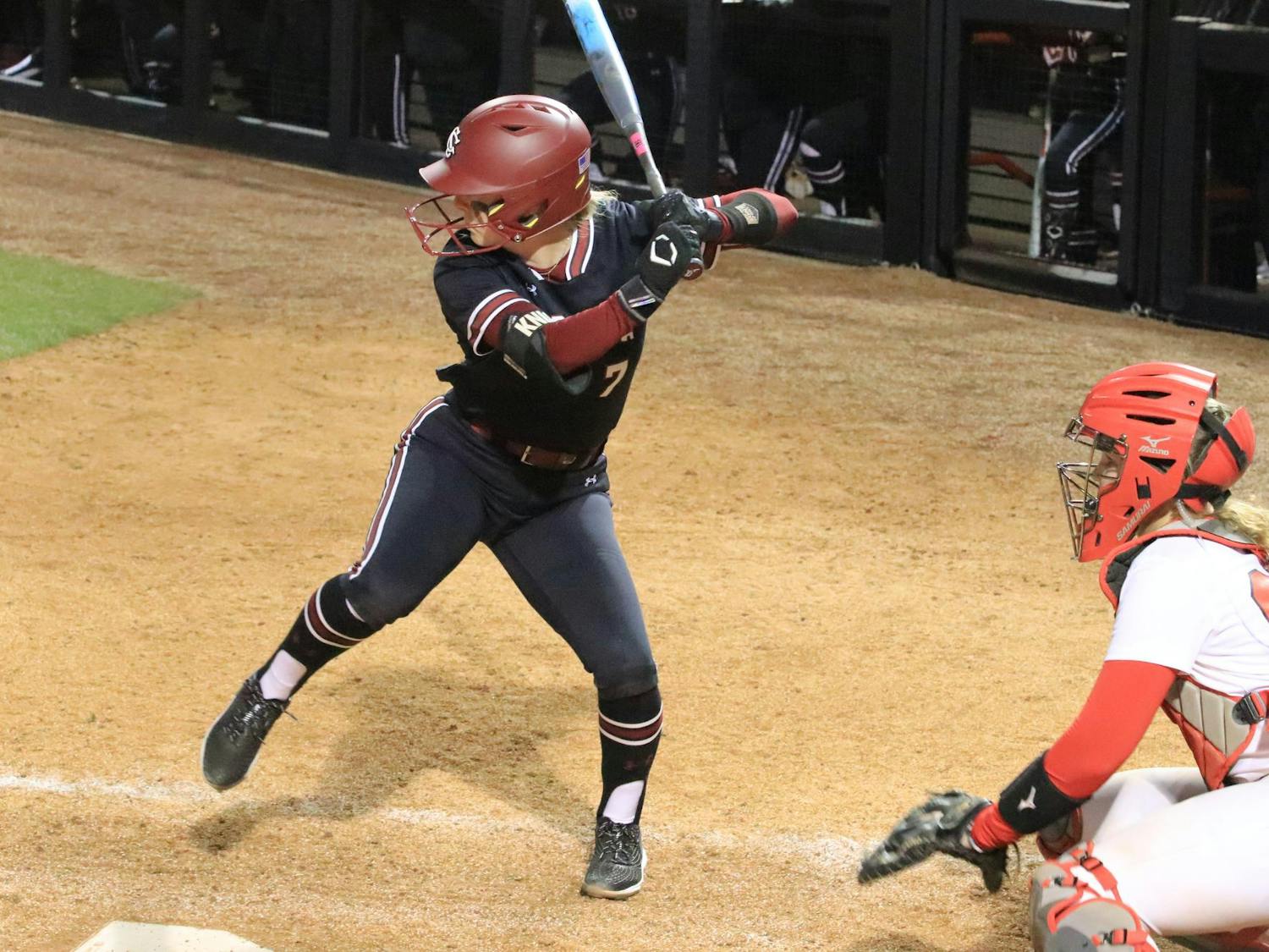 Sixth-year outfielder Abigail Knight keeps her eye on the ball as she prepares to swing the bat. During the 7:30 p.m. game against Miami University, Knight was at bat twice.