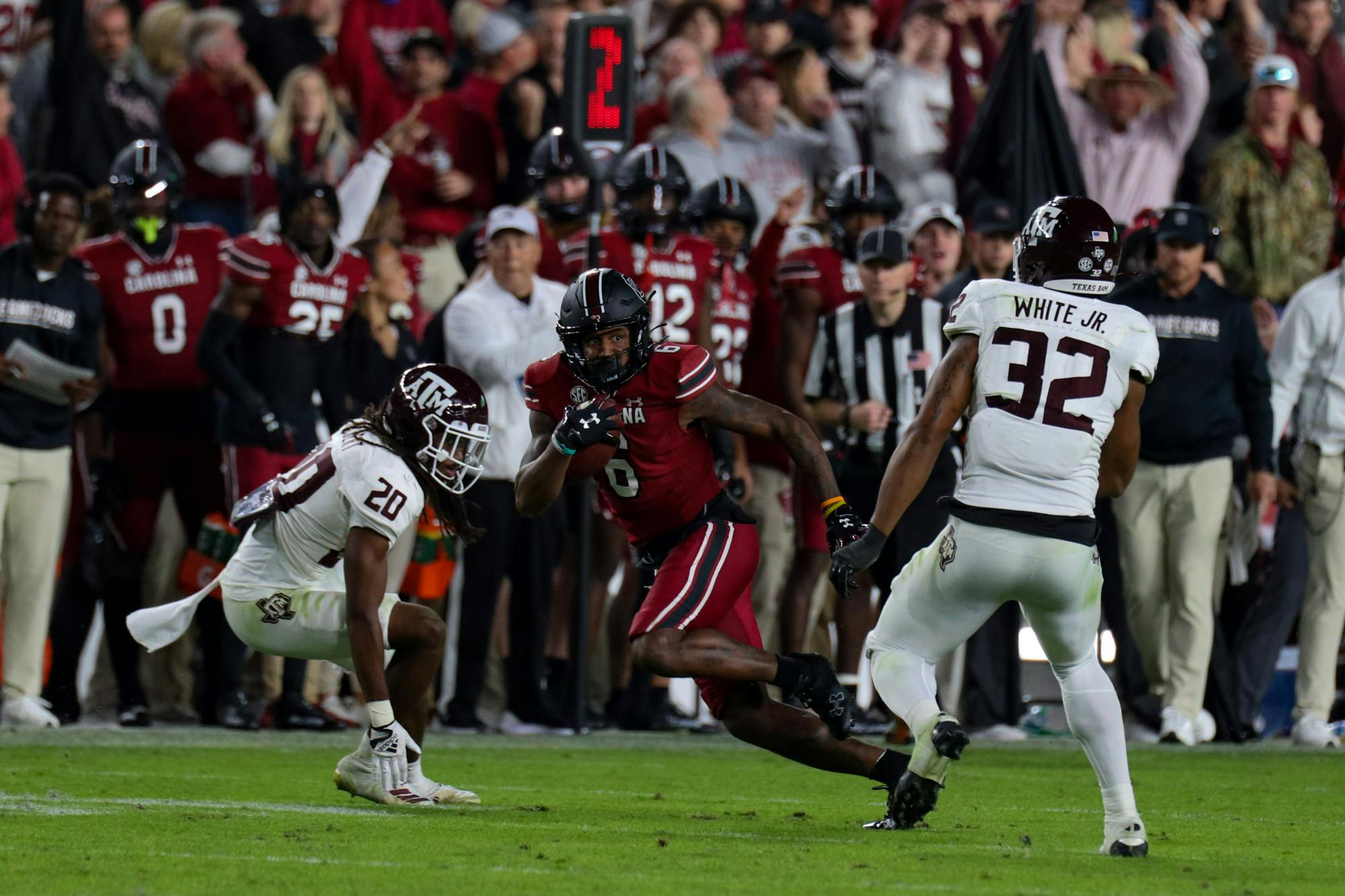 Fifth-year wide receiver Josh Vann finds the gap in between the Texas A&amp;M defenders after catching the ball in the fourth quarter in a game against the Texas A&amp;M Aggies at Williams-Brice Stadium on Oct. 22, 2022. South Carolina defeated Texas A&amp;M 30-24.