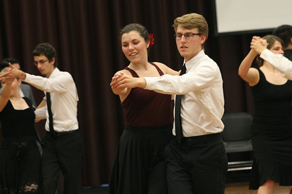 Carter Little, junior public health major, and Andrew Lopiano, junior political science and English double major, compete in Gamecock Invitational Ballroom Dance Competition.