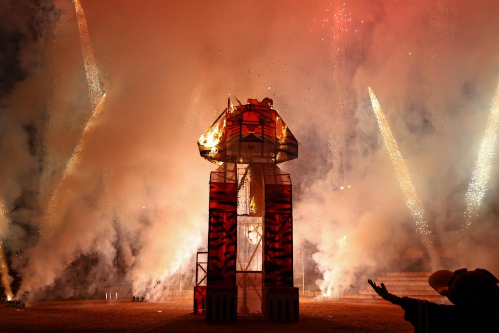 <p>FILE — A tiger statue burns during Tiger Burn at Blatt Field on Nov. 20, 2024. The statue was built over the course of several weeks by students in South Carolina's chapter of The American Society of Mechanical Engineers.</p>