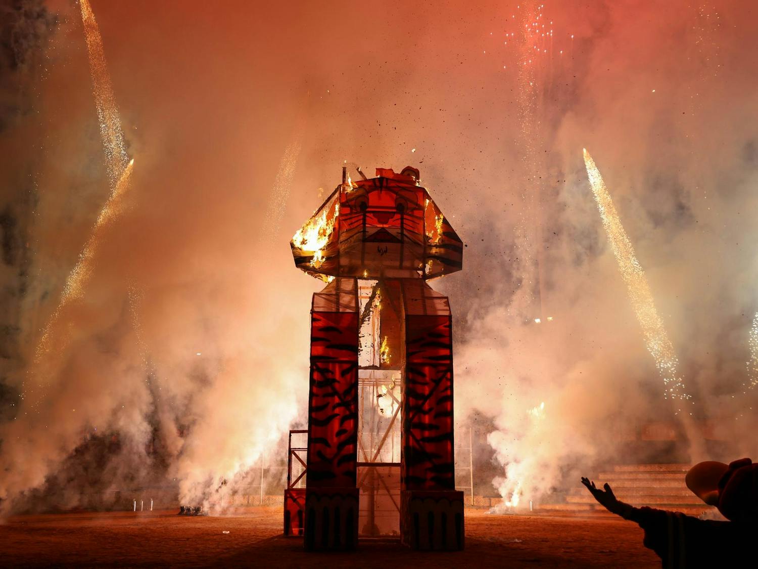 FILE — A tiger statue burns during Tiger Burn at Blatt Field on Nov. 20, 2024. The statue was built over the course of several weeks by students in South Carolina's chapter of The American Society of Mechanical Engineers.