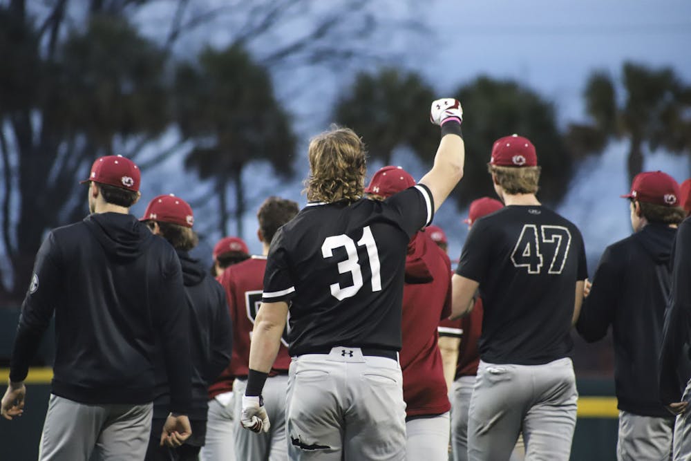 <p>Redshirt sophomore outfielder David Cromer celebrates as the first scrimmage to start off the 2023 season ends. Team Garnet beat team Black 4-2 at Founders Park on Feb. 1.&nbsp;</p>