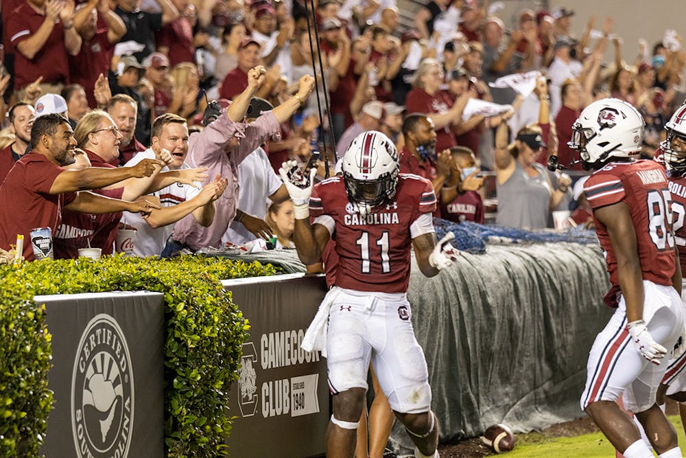 <p>Redshirt senior running back ZaQuandre White celebrates a touchdown after a 63-yard run downfield. This touchdown brought the Gamecocks to 39 points at the top of the fourth quarter.</p>