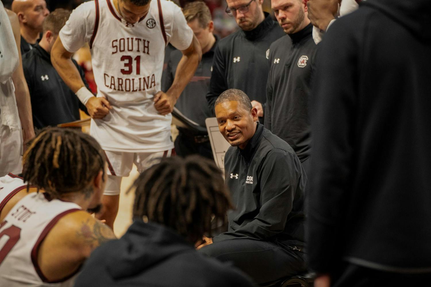 Men's basketball head coach Lamont Paris talks to his players on Nov. 13 during their 74-64 victory over Virginia Military Institute. During his seventh season as a collegiate head coach, Paris has led the ɫɫƵs to a 13-1 start.